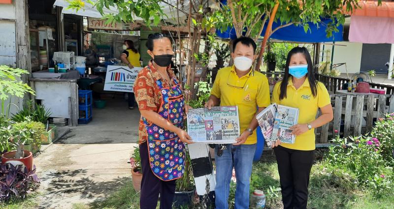 2.  มอบป้ายหนังสือชุมชนบ้านวังพลับ  หมู่  9  ต.ป่าพุทรา